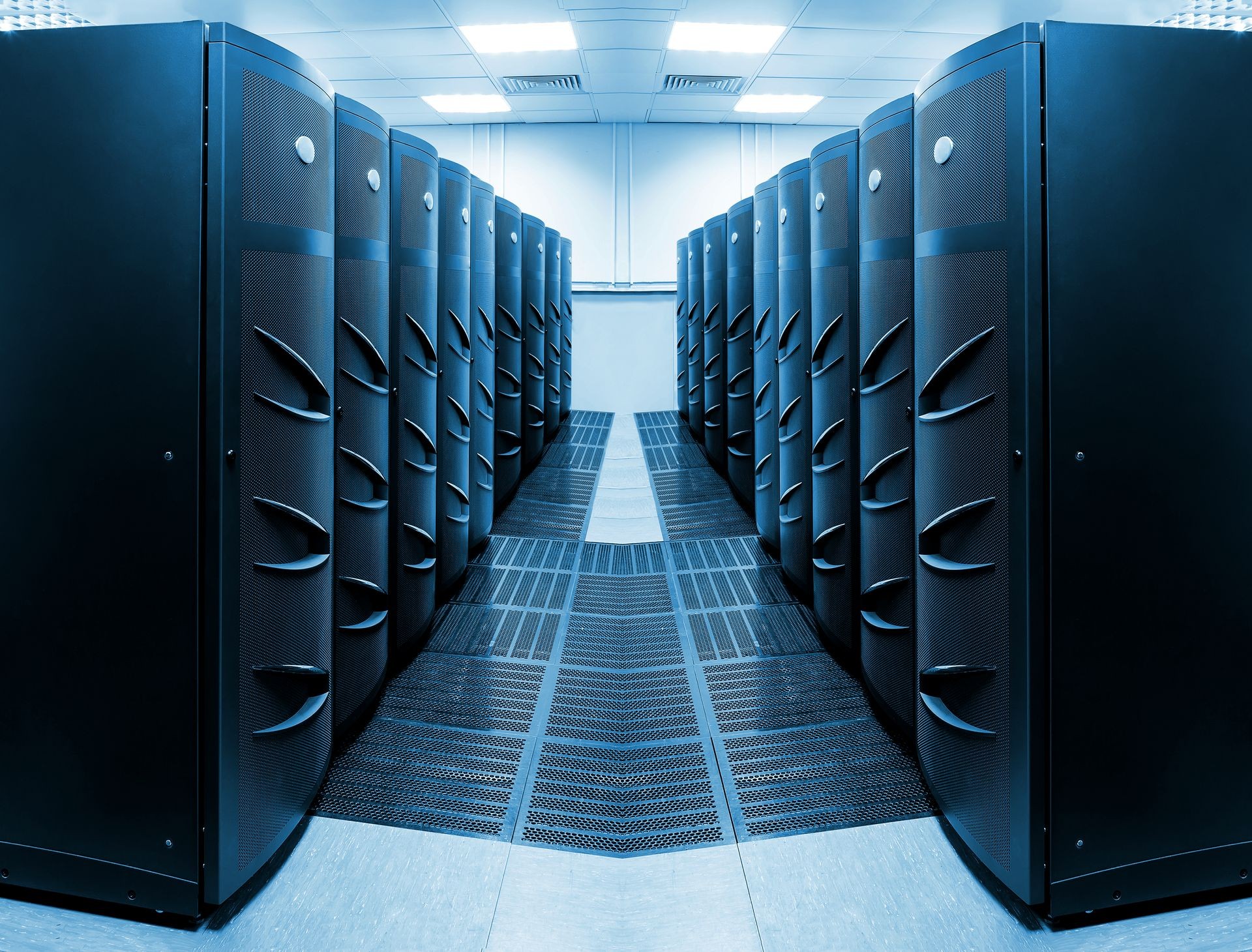 Modern web network and internet telecommunication technology, big data storage and cloud computing computer service business concept: server room interior in datacenter in blue light Modern web network and internet telecommunication technology, big data storage and cloud computing computer service business concept: server room interior in datacenter in blue light